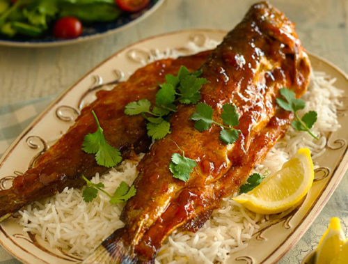 Whole fish on the braai with apricot glaze