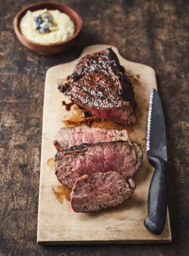 Coffee-rubbed rib-eye steak with a buttermilk-gorgonzola cheese sauce