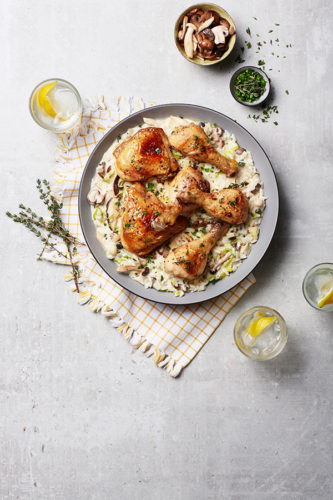 Creamy mushroom and leek rice with crispy chicken thighs